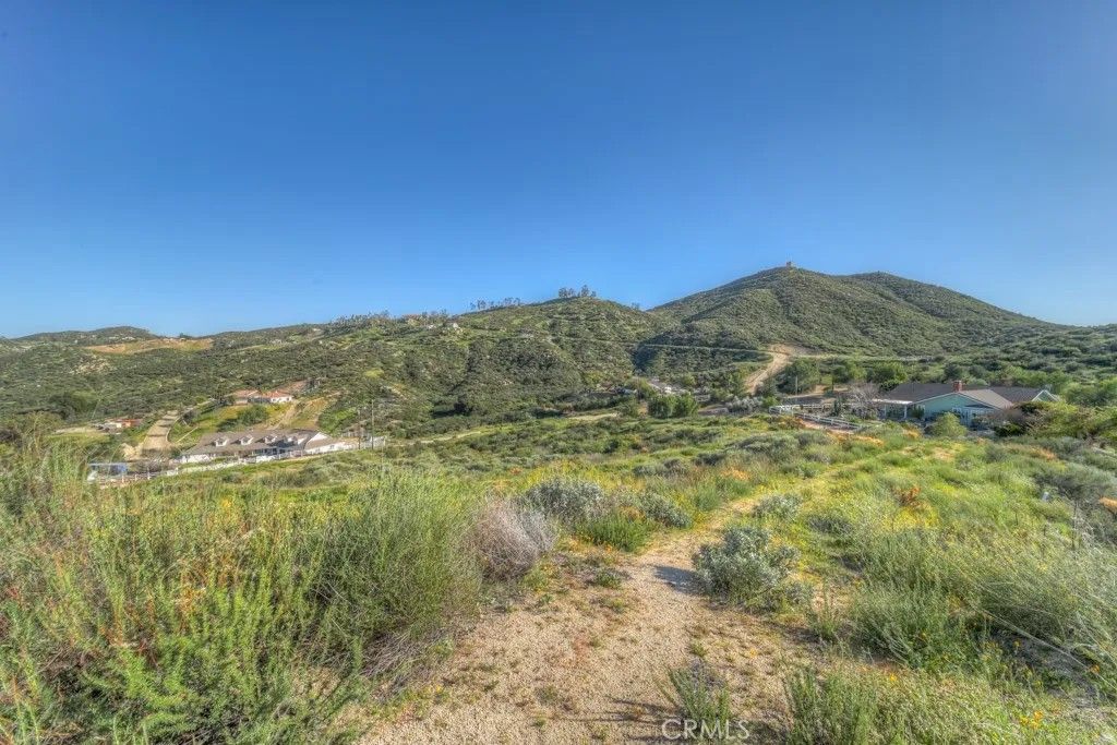 Photo of 32465 Crooked Arrow Dr, Wildomar, CA 92595 (MLS # SW26049157)