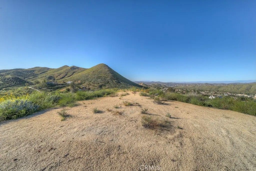 Photo of 32465 Crooked Arrow Dr, Wildomar, CA 92595 (MLS # SW26049157)