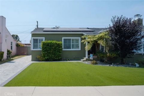 Photo of 3815 Welland Avenue, Los Angeles, CA 90008 (MLS # DW25277354)