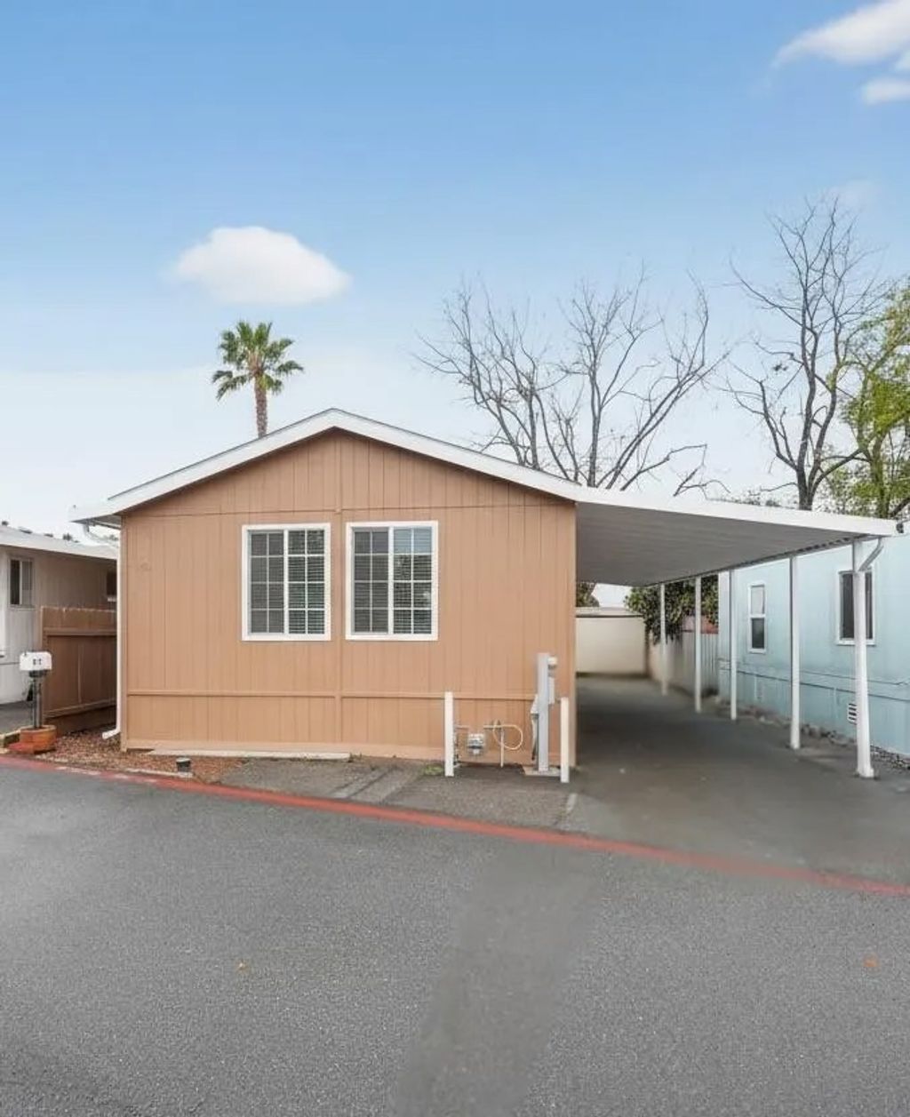 Photo of 220 Camino Corto #SPC 100, Vista, CA 92083 (MLS # 260003535)