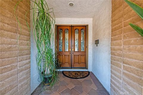 Photo of 23316 Gray Fox Dr, Canyon Lake, CA 92587 (MLS # IV25232610)