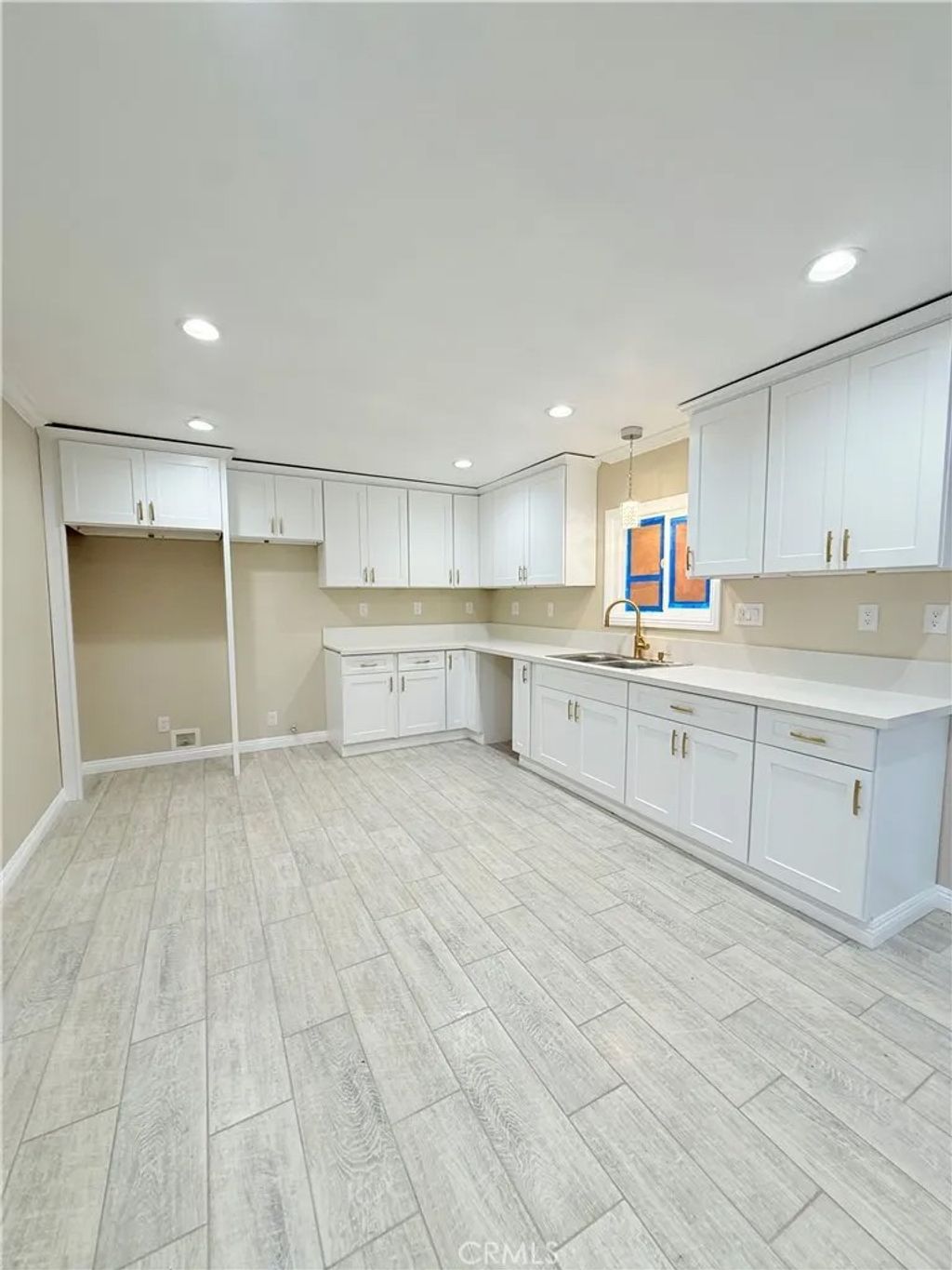 Photo of 838 E 99th St, Los Angeles, CA 90002 (MLS # SB26000371)