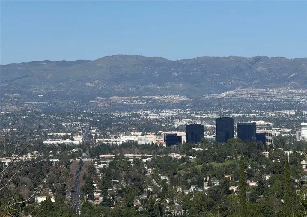 Photo of 3300 N Topanga Canyon Blvd, Woodland Hills, CA 91364 (MLS # CV26011442)