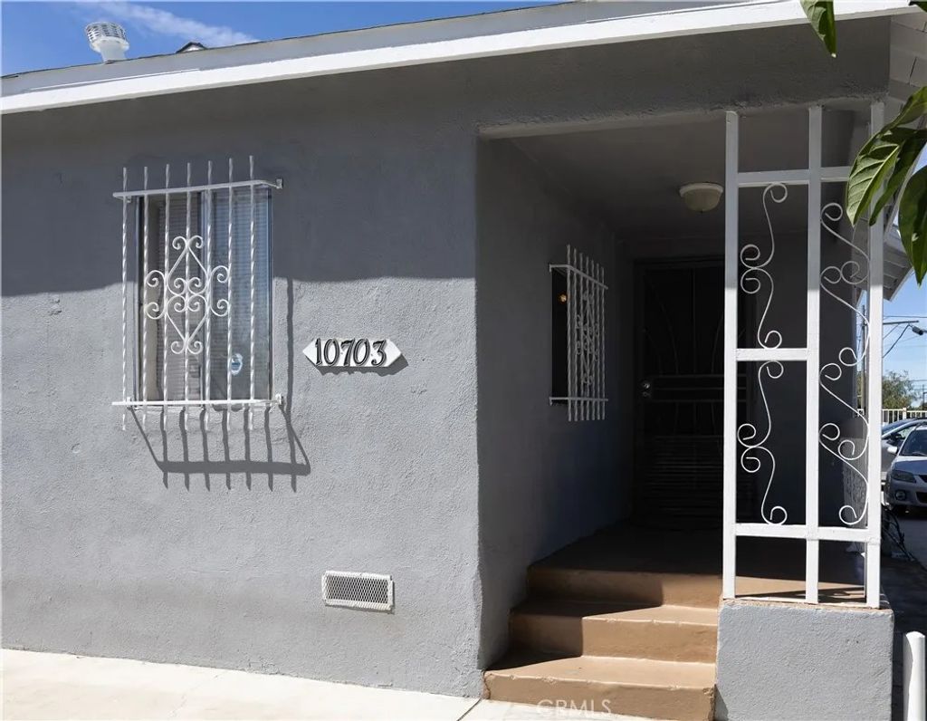 Photo of 10703 Anzac, Los Angeles, CA 90059 (MLS # DW26073468)