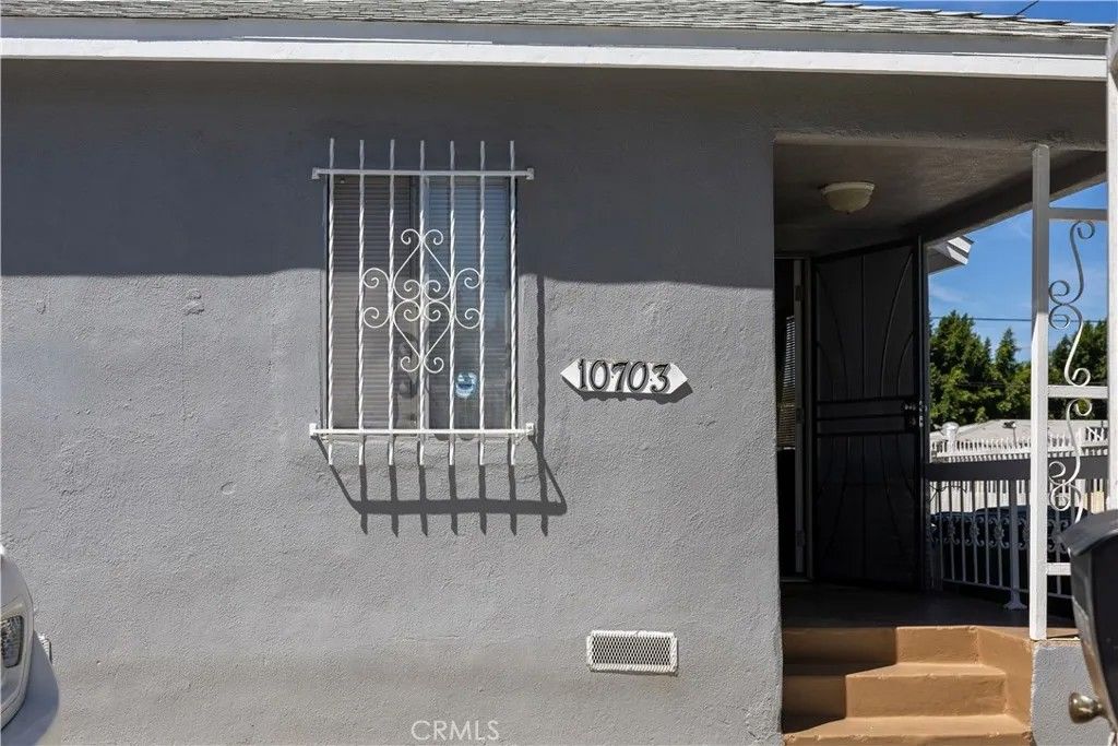 Photo of 10703 Anzac, Los Angeles, CA 90059 (MLS # DW26073468)
