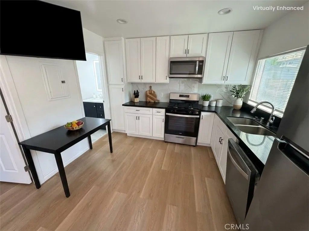 Photo of 12610 Martha Street #2, Valley Village, CA 91607 (MLS # SR26009943)