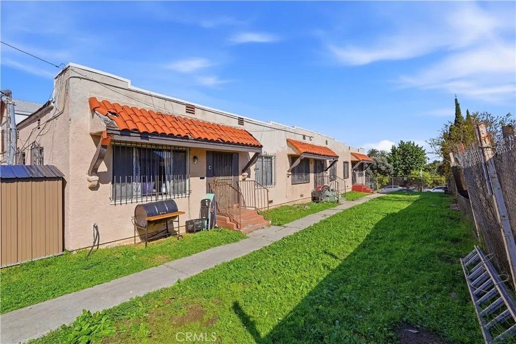Photo of 11143 Van Buren Ave, Los Angeles, CA 90044 (MLS # SR26036537)