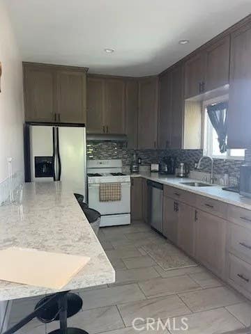 Photo of 3729 W 115th ST, Hawthorne, CA 90250 (MLS # DW26101197)