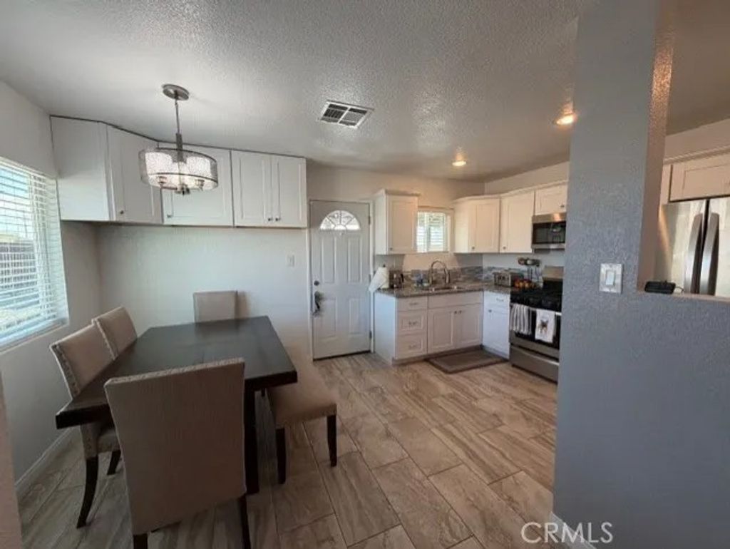 Photo of 28074 Ironwood Drive, Barstow, CA 92311 (MLS # HD26097360)