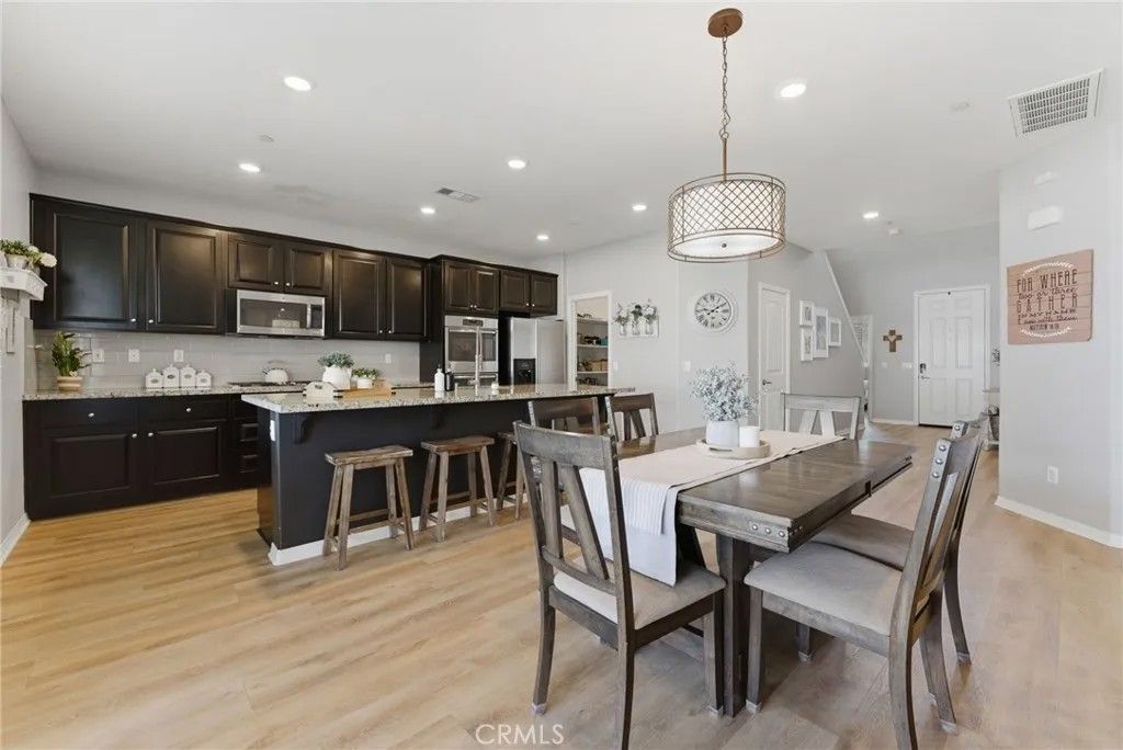 Photo of 11471 Autumn Sage Avenue, Jurupa Valley, CA 91752 (MLS # CV26104840)