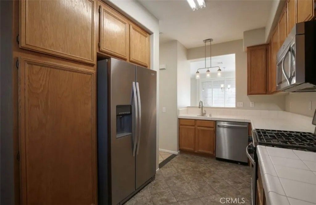 Photo of 30345 Buccaneer Ln #D, Murrieta, CA 92563 (MLS # IG25249338)