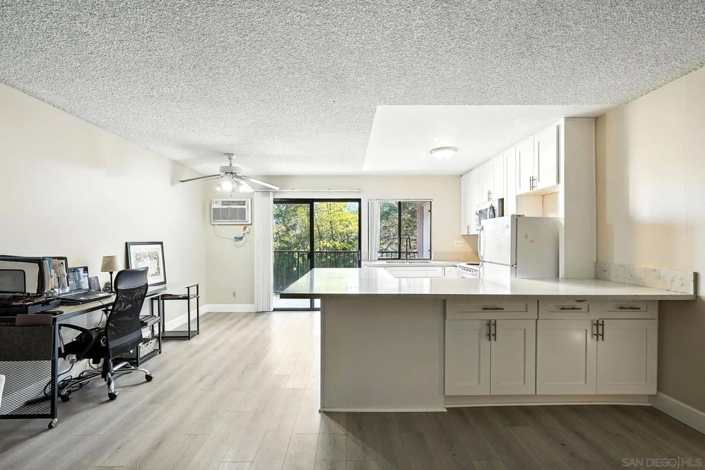 Photo of 7838 Cowles Mountain Court #C6, San Diego, CA 92119 (MLS # 250044067)