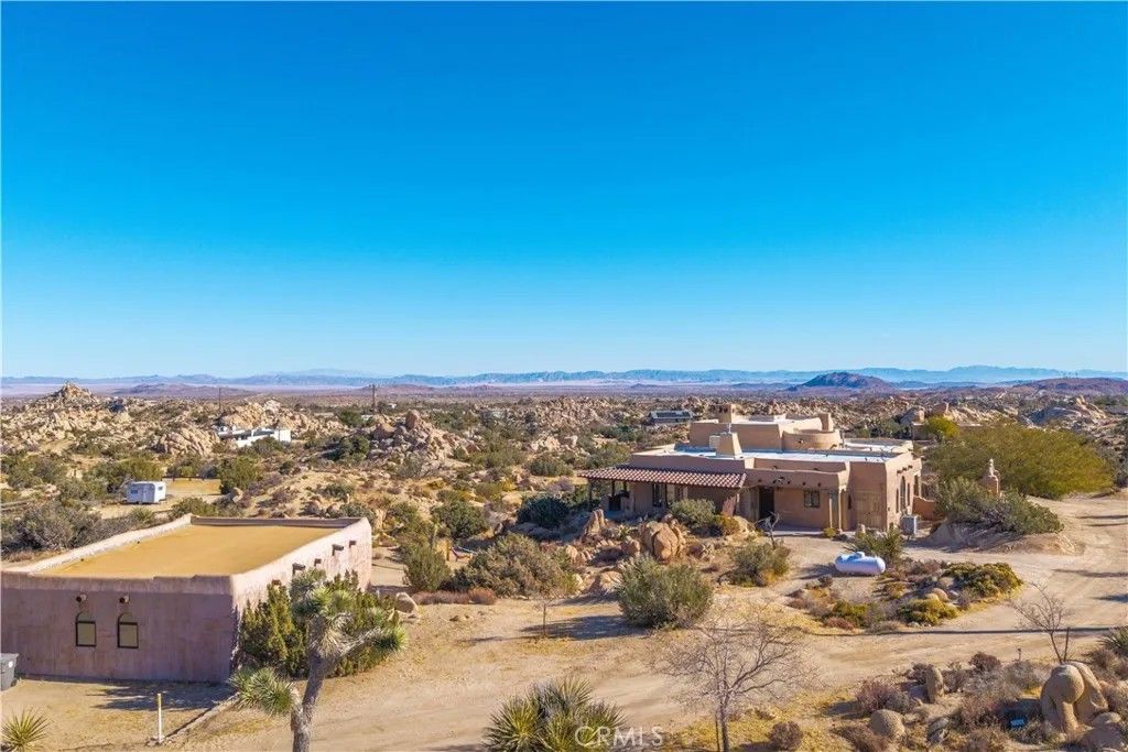 Photo of 5597 Acoma Trail, Yucca Valley, CA 92284 (MLS # JT26002821)
