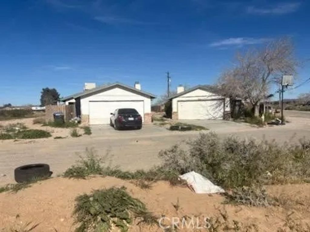 Photo of 9231 N Loop Blvd, California City, CA 93505 (MLS # DW26055269)