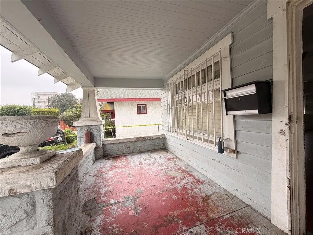 Photo of 1040 W 45th Street, Los Angeles, CA 90037 (MLS # NP26053394)