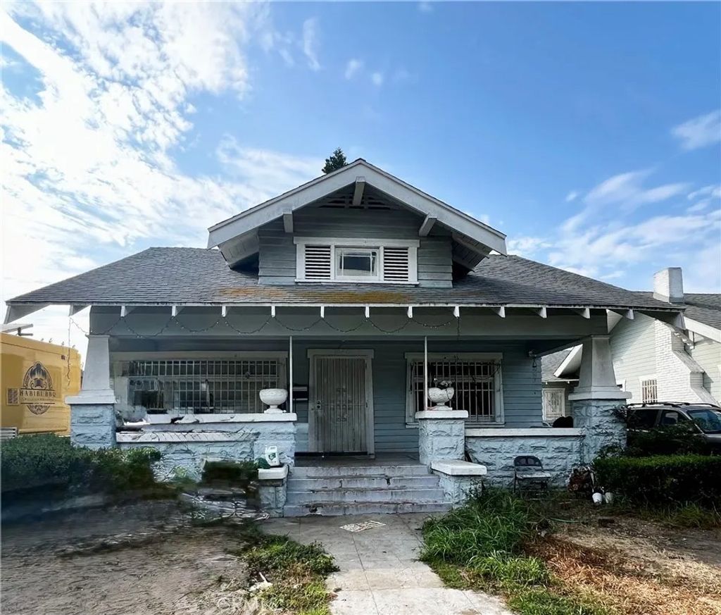 Photo of 1040 W 45th Street, Los Angeles, CA 90037 (MLS # NP26053394)
