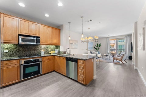 Photo of 3877 Pell Place #307, San Diego, CA 92130 (MLS # 260012549)