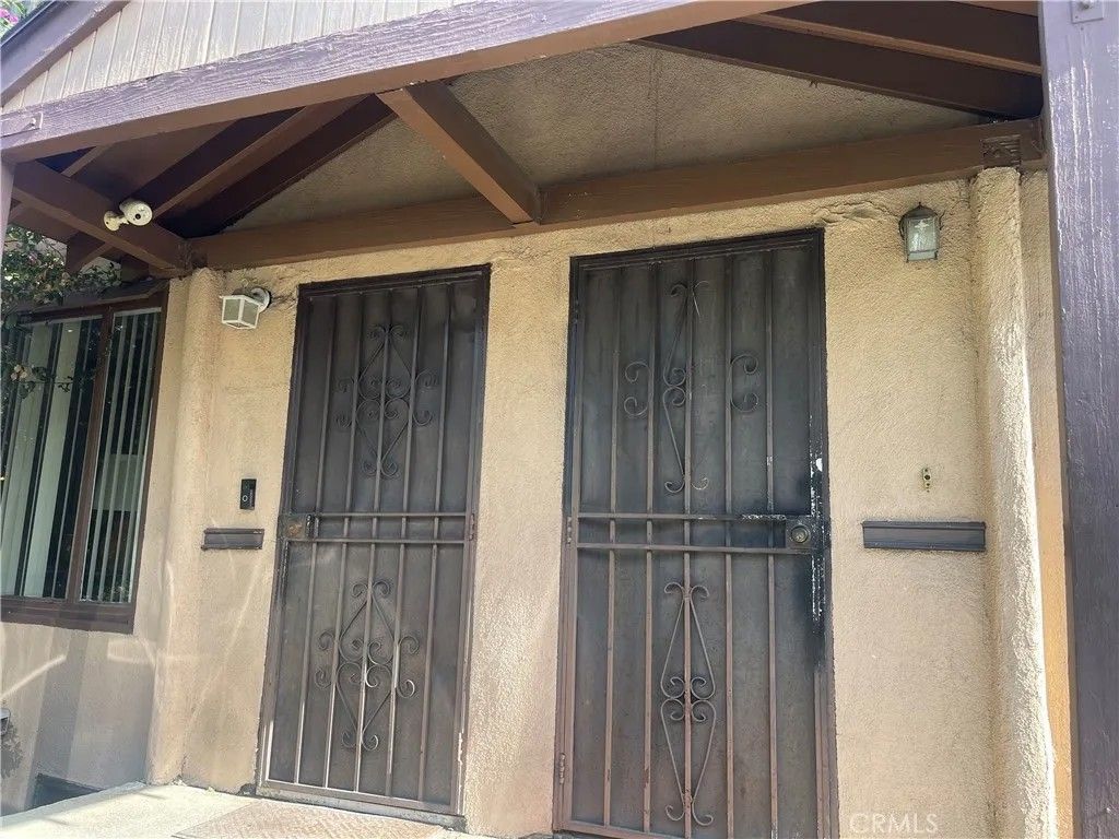 Photo of 1750 S Mansfield Avenue, Los Angeles, CA 90019 (MLS # IV25272337)