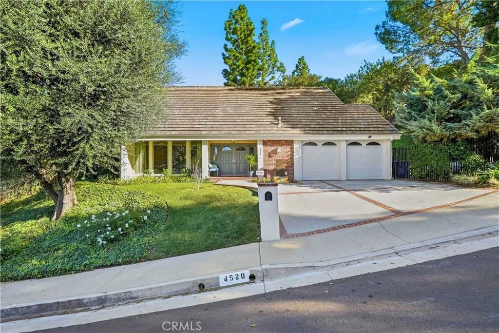 Photo of 4520 Cezanne Avenue, Woodland Hills, CA 91364 (MLS # SR25259288)