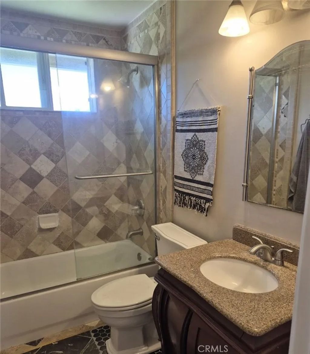 Photo of 11871 Topaz Cir, Garden Grove, CA 92845 (MLS # OC26091031)