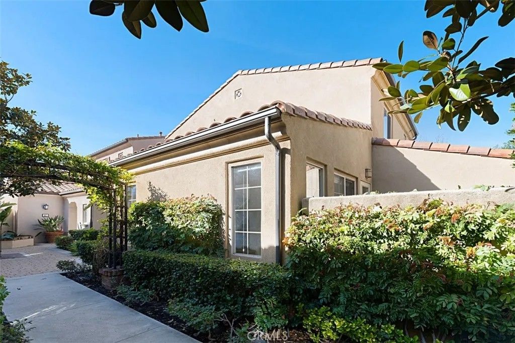 Photo of 8 Iceberg Rose, Irvine, CA 92620 (MLS # OC26035424)