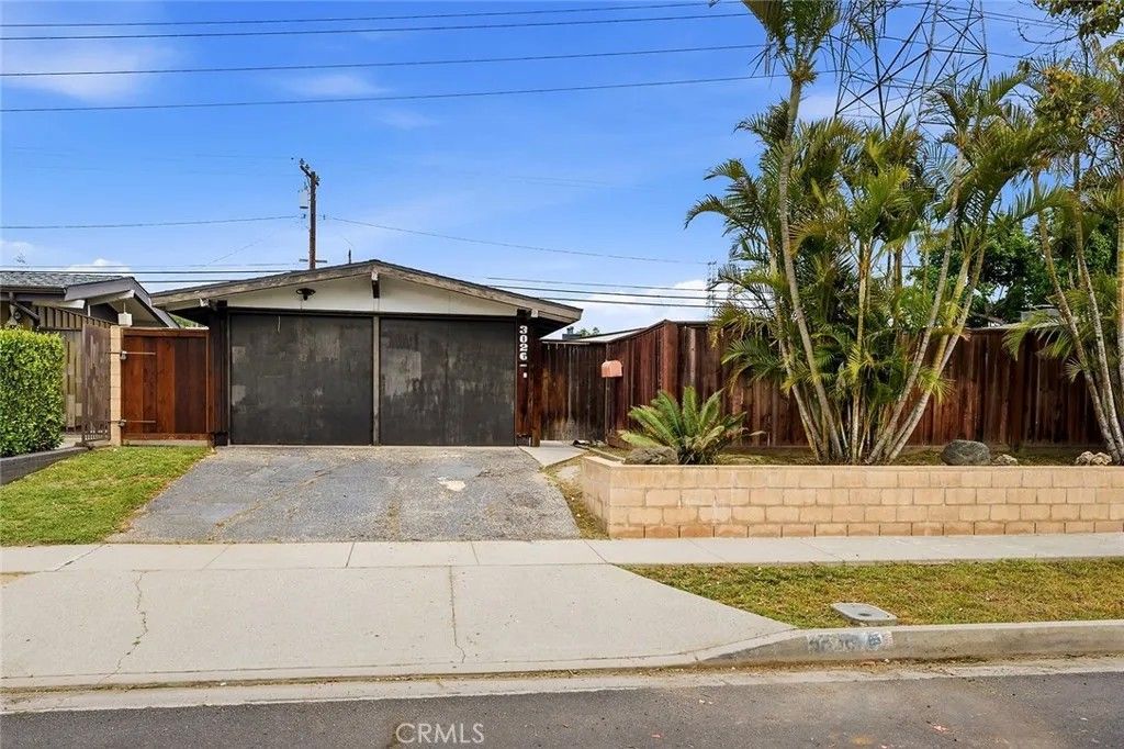 Photo of 3026 Stevely Avenue, Long Beach, CA 90808 (MLS # PW26097178)