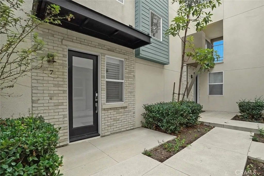 Photo of 318 Bridgewater Way #7, Gardena, CA 90247 (MLS # SB26028420)