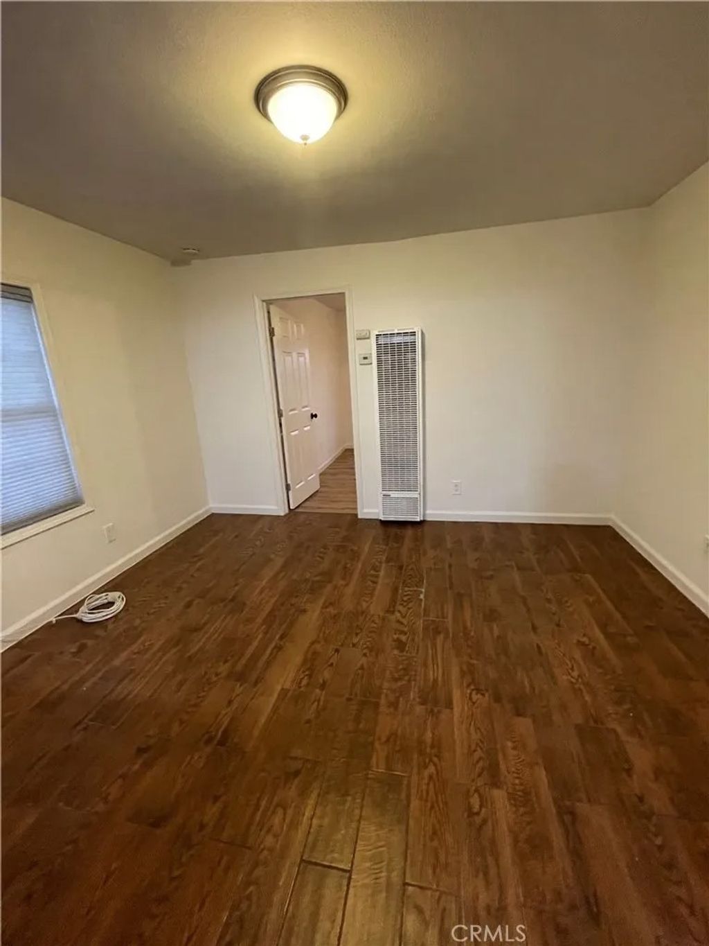 Photo of 6141 Marbrisa Ave #D, Huntington Park, CA 90255 (MLS # DW25279474)