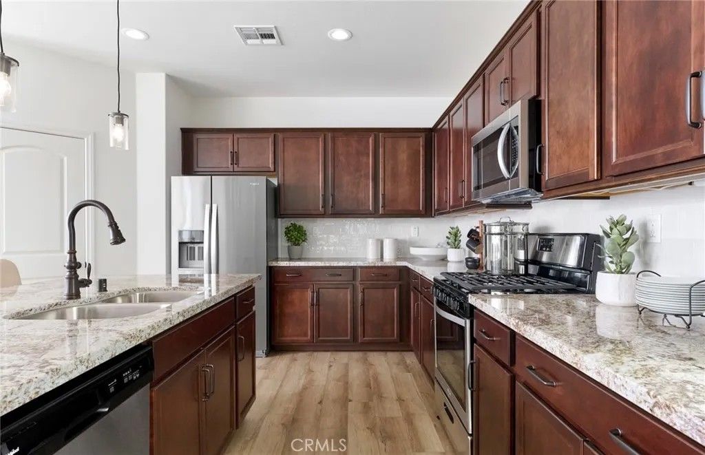 Photo of 739 Spyglass Court, Perris, CA 92571 (MLS # IV25282305)