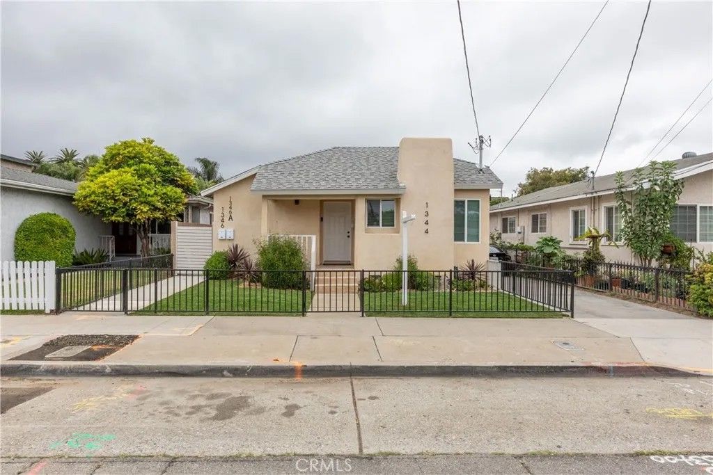 Photo of 1344 Ximeno Ave, Long Beach, CA 90804 (MLS # RS26011398)