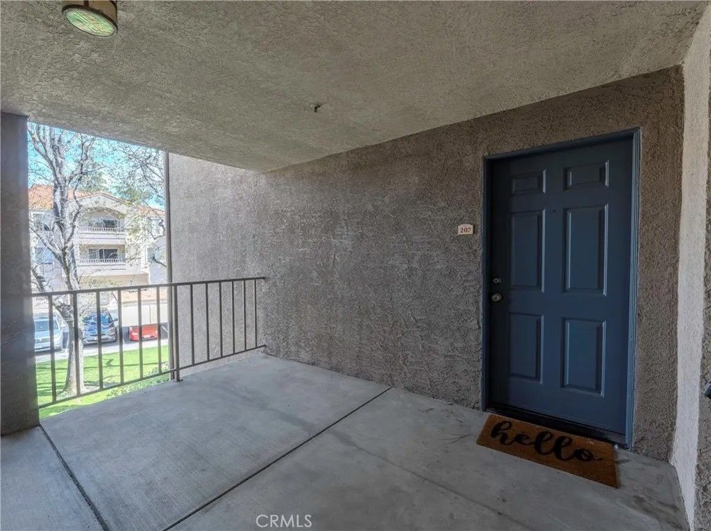 Photo of 1010 La Terraza Cir #207, Corona, CA 92879 (MLS # IV26047840)