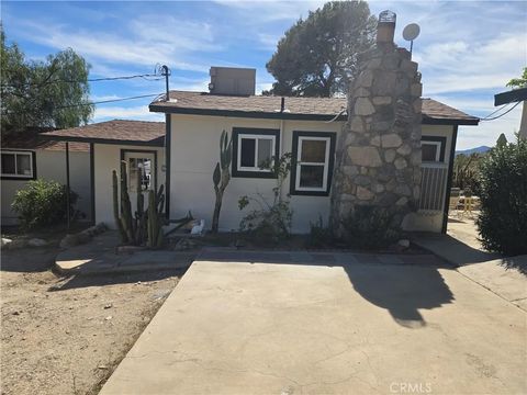 Photo of 8996 Navajo Trail, Morongo Valley, CA 92256 (MLS # JT26055873)