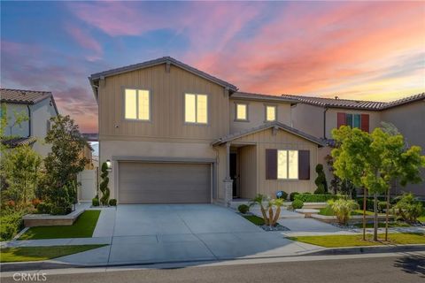 Photo of 2227 Melogold Way, Corona, CA 92883 (MLS # SW26054140)