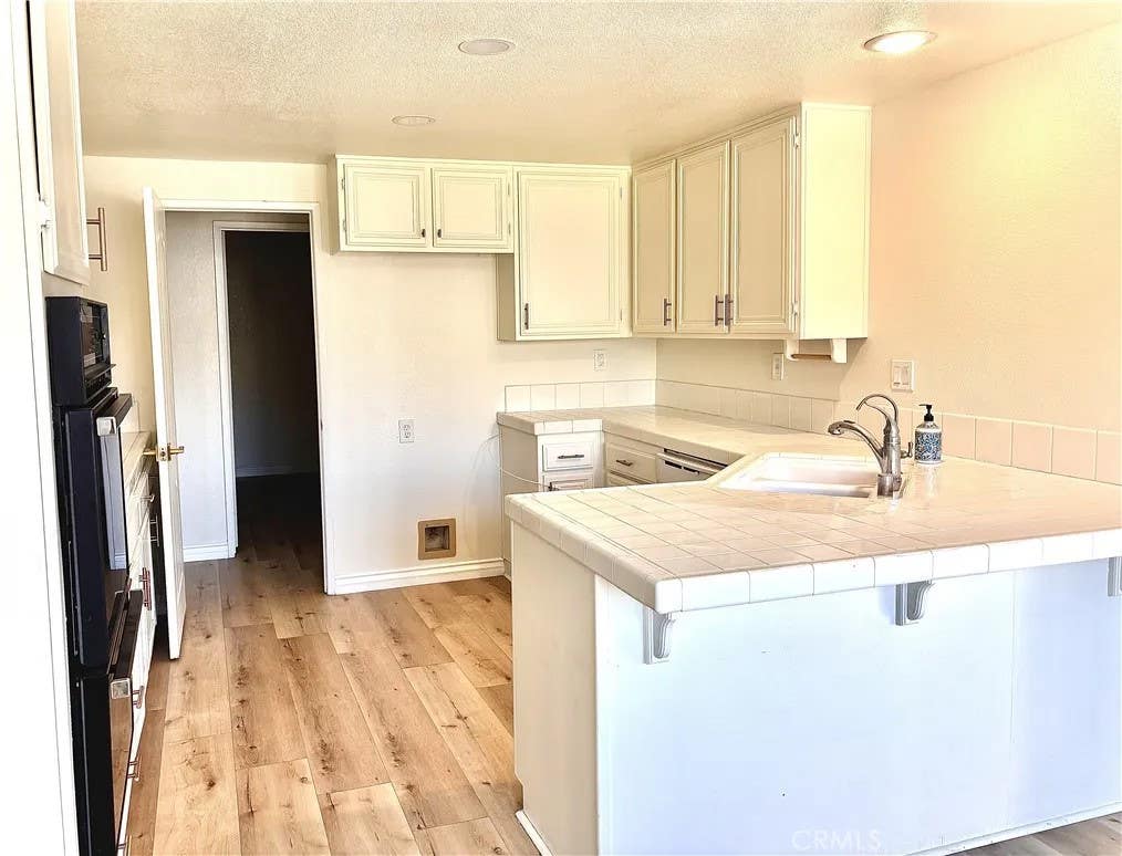 Photo of 1217 Avenida Roundelay, San Jacinto, CA 92583 (MLS # SW26186354)