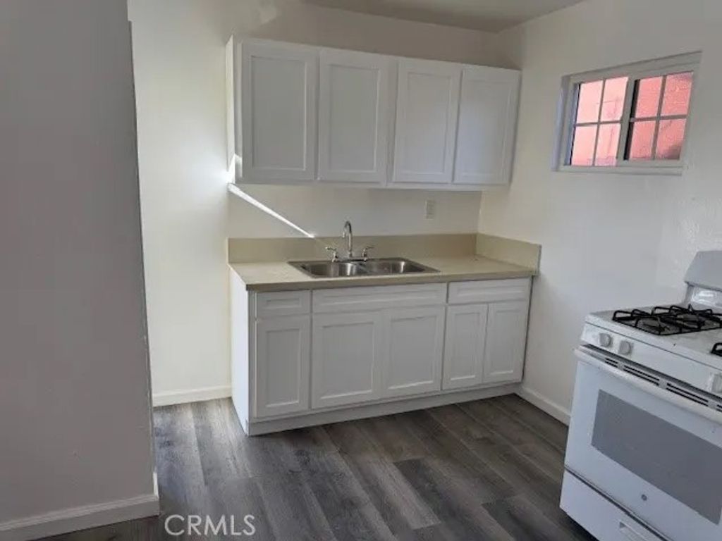 Photo of 1159 E 74th St, Los Angeles, CA 90001 (MLS # DW25281453)