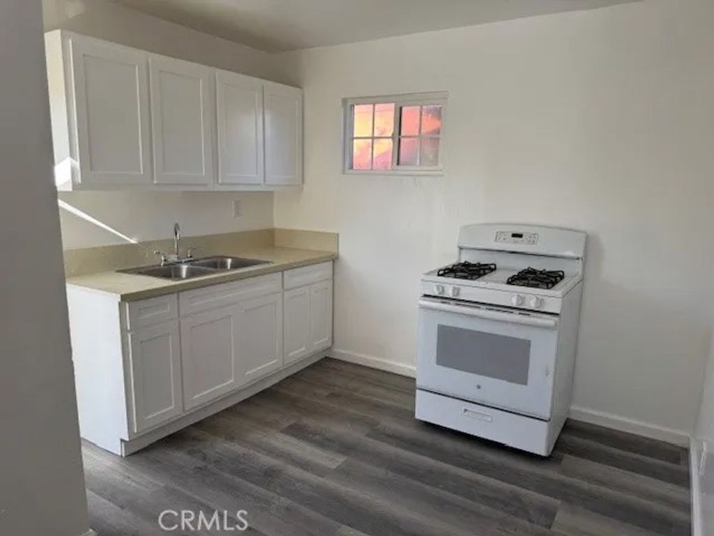 Photo of 1159 E 74th St, Los Angeles, CA 90001 (MLS # DW25281453)