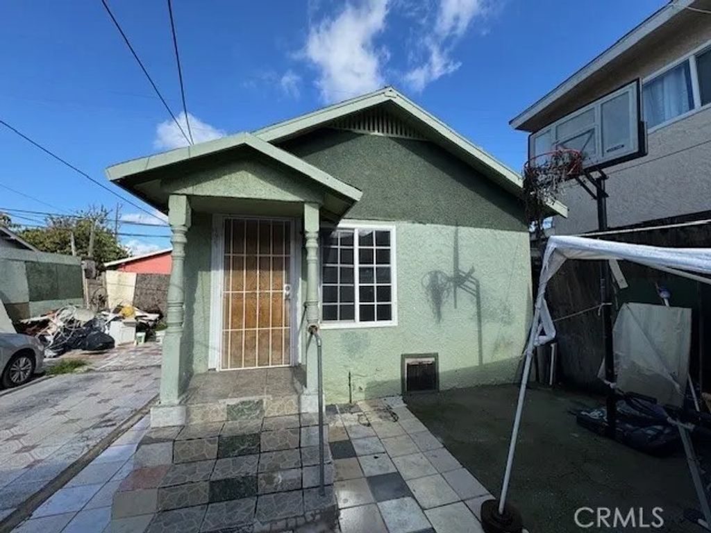 Photo of 1159 E 74th St, Los Angeles, CA 90001 (MLS # DW25281453)
