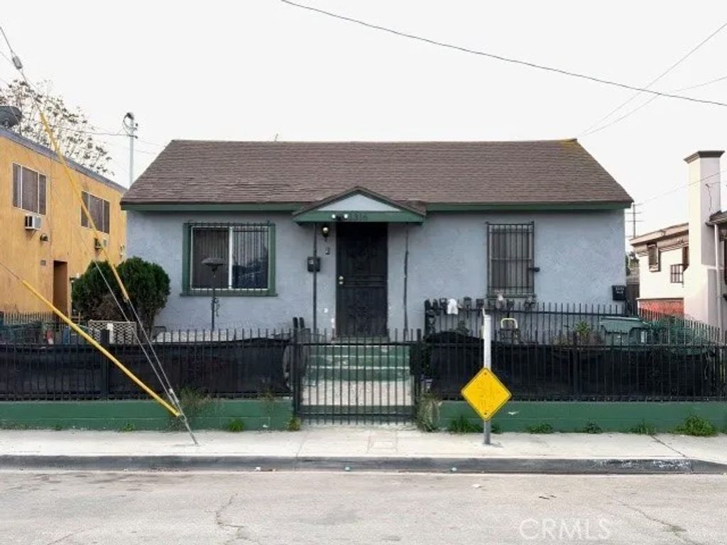 Photo of 1316 E 75th St, Los Angeles, CA 90001 (MLS # SR26031336)
