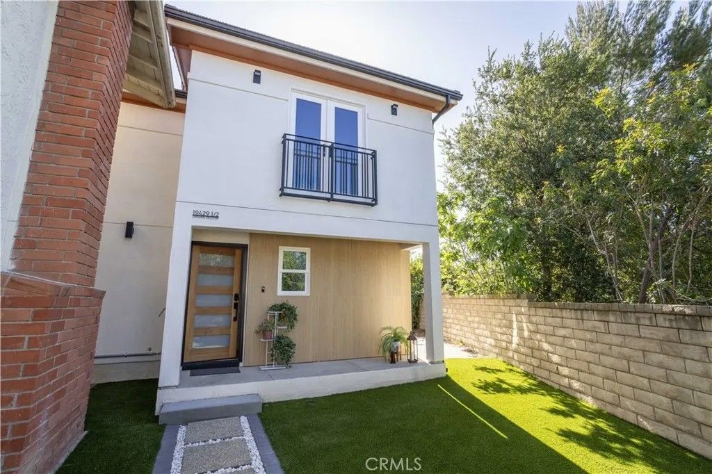 Photo of 19429 Singing Hills Drive, Porter Ranch, CA 91326 (MLS # SR26093304)