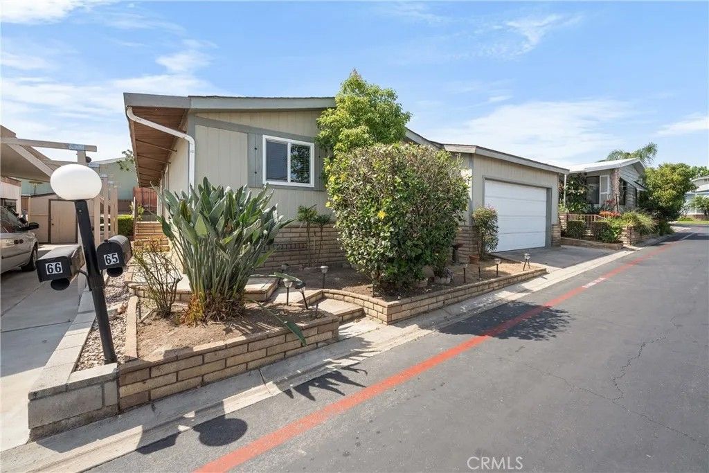Photo of 1550 Rimpau Ave #65, Corona, CA 92881 (MLS # OC26076655)