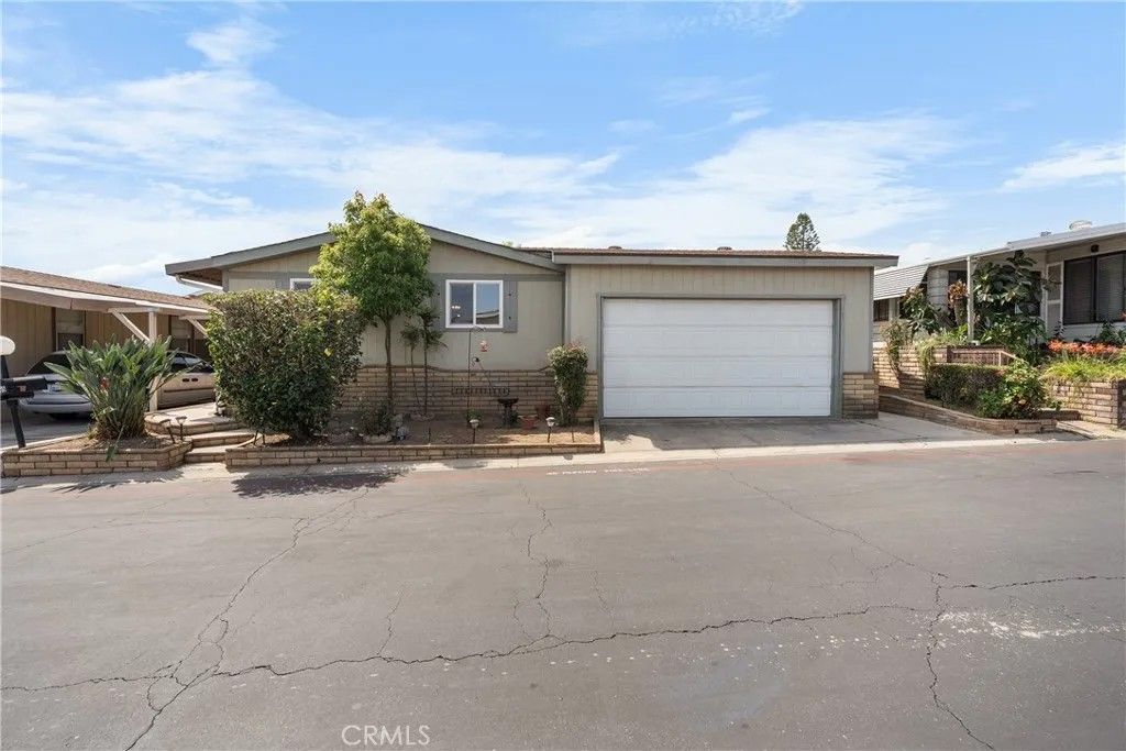 Photo of 1550 Rimpau Ave #65, Corona, CA 92881 (MLS # OC26076655)