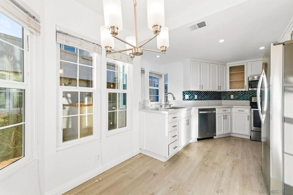 Photo of 15905 Avenida Villaha #80, San Diego, CA 92128 (MLS # 250043173)