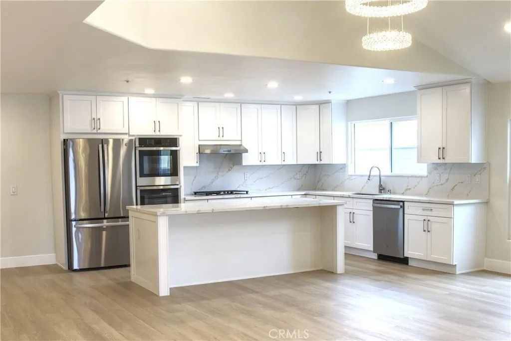 Photo of 1308 Elm Ave, Torrance, CA 90503 (MLS # OC26077230)