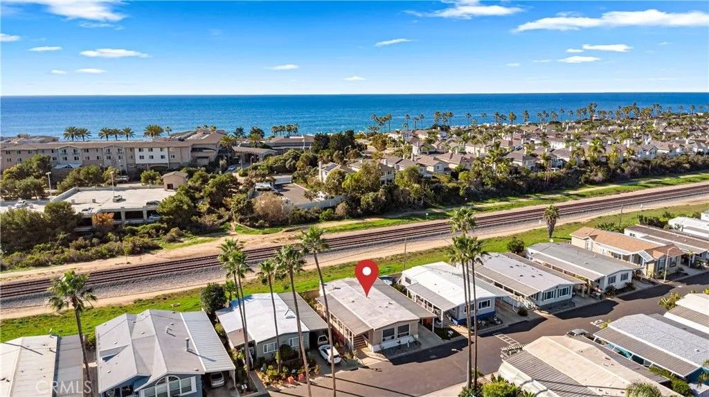 Photo of 7221 San Luis St, Carlsbad, CA 92011 (MLS # SW26010212)