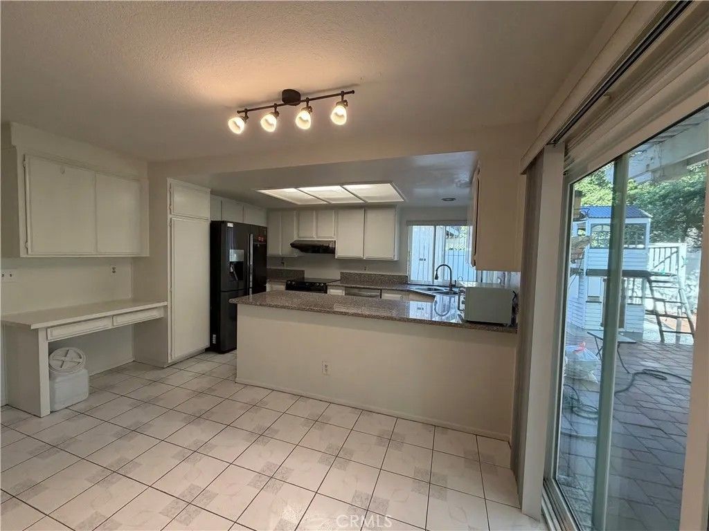 Photo of 1620 Coach Pl, Hacienda Heights, CA 91745 (MLS # AR26001007)