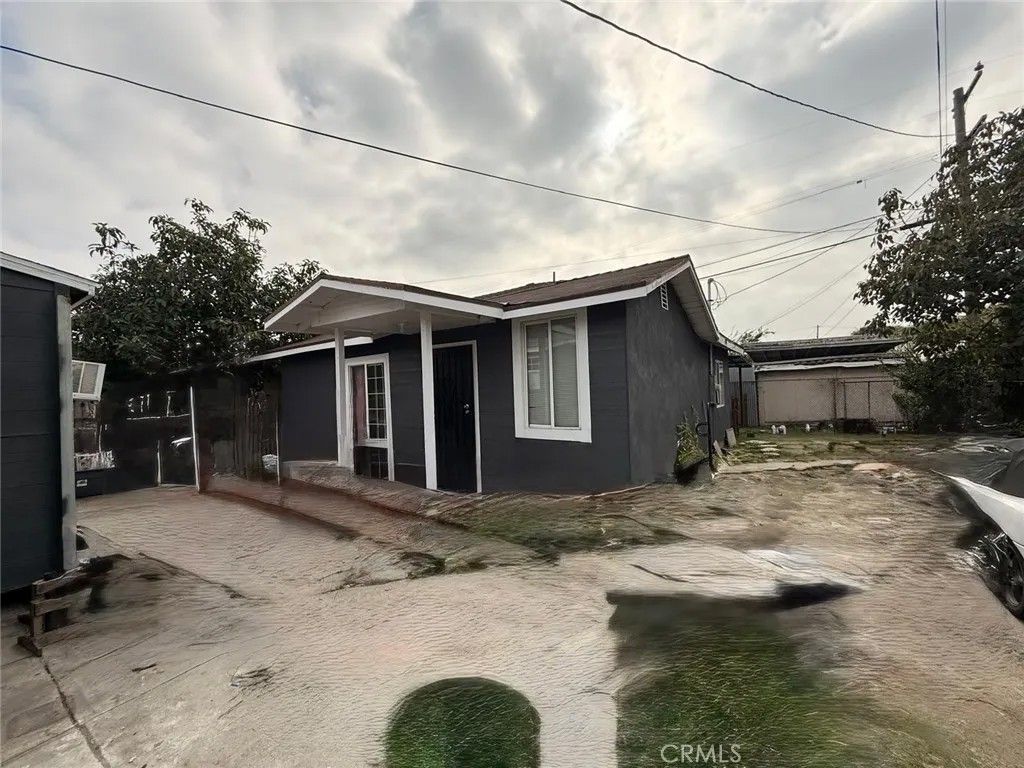 Photo of 1420 E 77th Place, Los Angeles, CA 90001 (MLS # IV26006357)