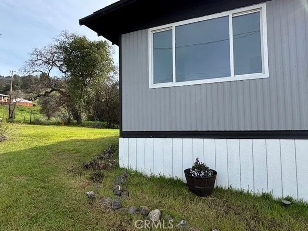 Photo of 6397 Dixie Road, Lucerne, CA 95458 (MLS # LC26036150)