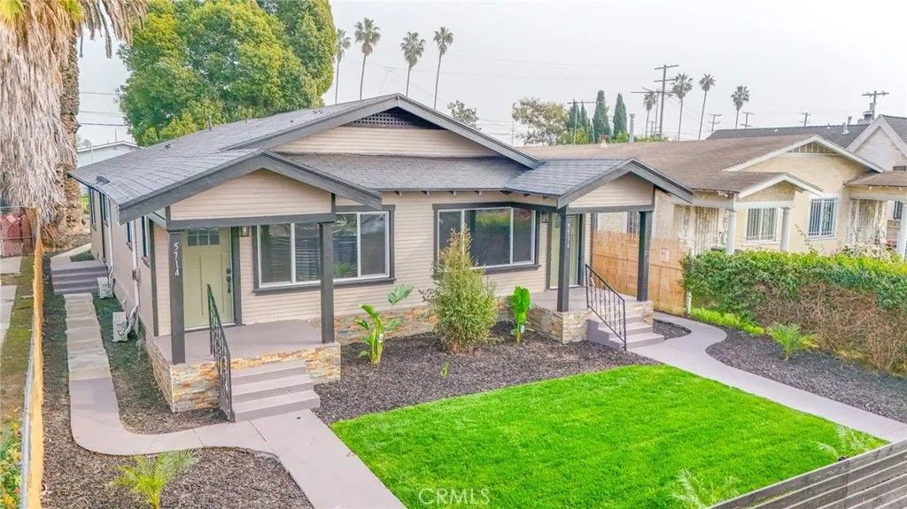 Photo of 5714 S St Andrews Pl, Los Angeles, CA 90062 (MLS # DW26016071)