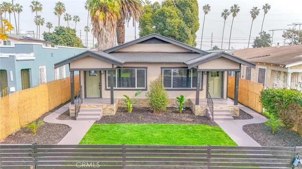 Photo of 5714 S St Andrews Pl, Los Angeles, CA 90062 (MLS # DW26016071)