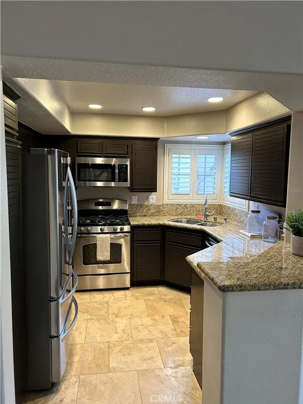 Photo of 8070 E Goldenrod Ln, Anaheim, CA 92808 (MLS # PW26018211)